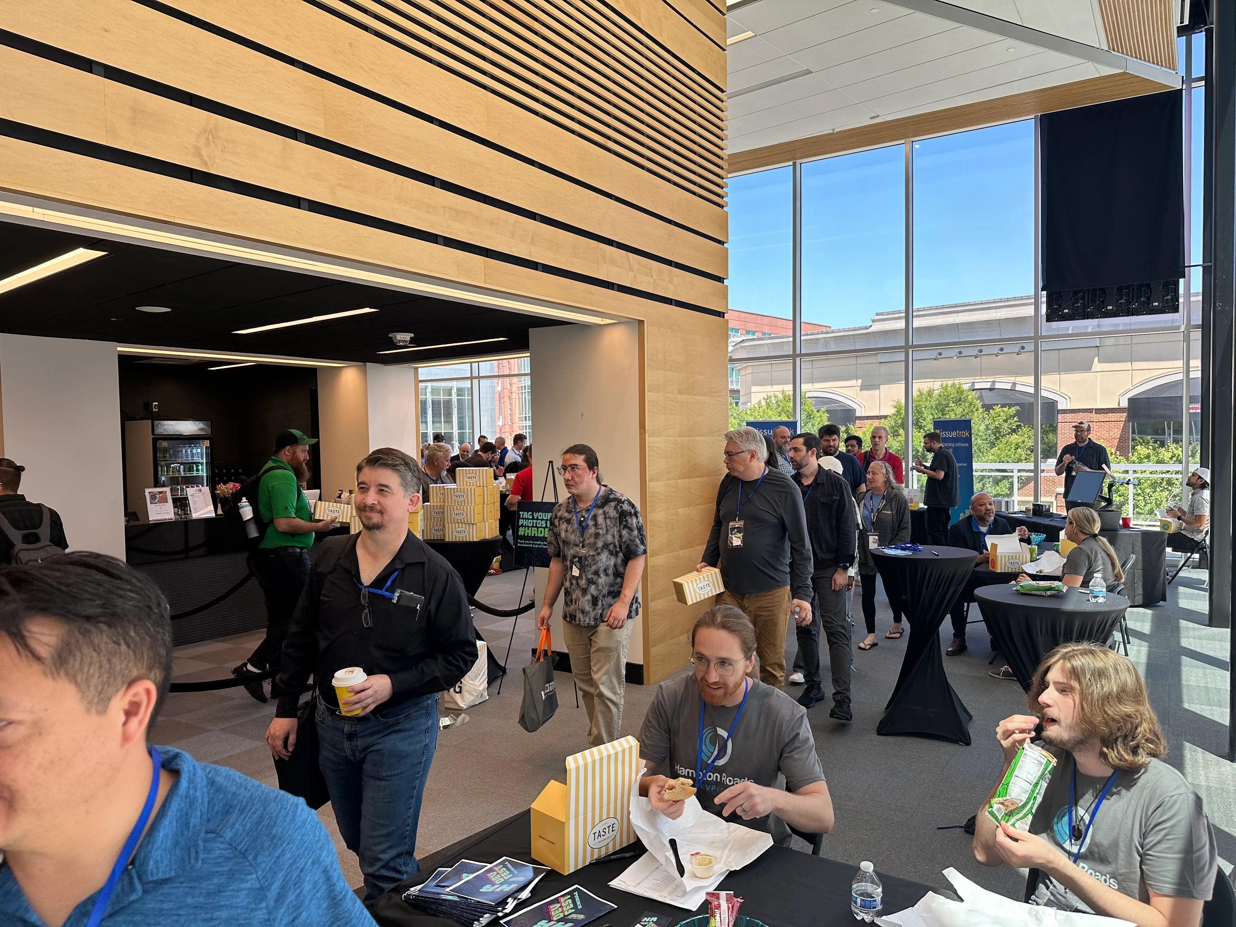 Attendees mingling during conference break